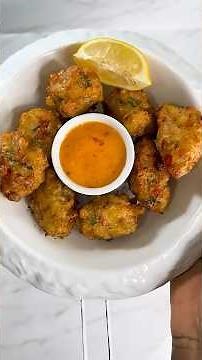 Irresistible Caribbean Conch Fritters Recipe - Crispy & Flavorful Treat! #CaribbeanCuisine #Yum