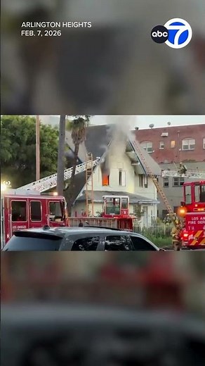 Shocking video shows firefighter fall from ladder while battling house fire