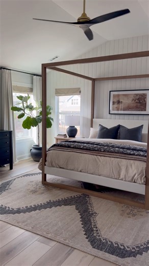 "This vaulted ceiling has been BEGGING for a canopy bed (bit.ly/49nw3kQ). The nightstands (bit.ly/3T6u135) have a vintage feel with these cute little key holes, and this dresser (bit.ly/3T4QoWn) has my heart 😍. Even though the curtains (bit.ly/3I5WXSf) are blackout, they still have a light, airy feel. The linen bedding (bit.ly/3SKwBu7) and hydro-cool duvet and pillows are heavenly… and how gorgeous is this new floral reversible quilt (https://bit.ly/4bJwkQG)?!I feel like I’m in a luxury resort.