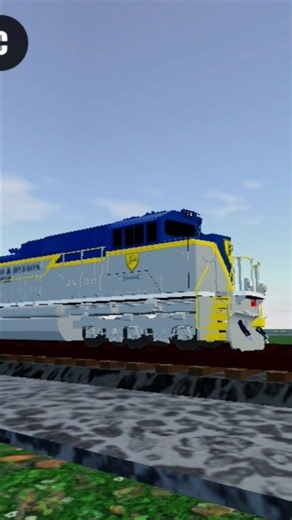 NS D&H heritage unit SD70ACE leads a Grainer ro scale sandbox