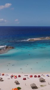 Pretty little beach for your pretty little getaway 💛 Baby Beach in Aruba is as calm as it is stunning. Perfect for floating, playing, and forgetting what day it is. Bring the kids and your “we’re never leaving” energy. 🐚☀️ #BabyBeachAruba #FamilyBeachVibes #PrettyLittleGetaway #ArubaWithKids #BeachDaysForever | Aruba