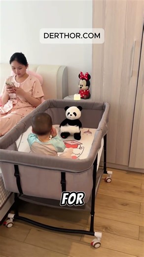 Whoever invented this peek-a-boo panda, I'll thank you for eight lifetimes! It wakes up on its
