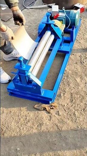 Operating a Manual Sheet Metal Rolling Machine to Shape Flat Steel into Smooth Curves