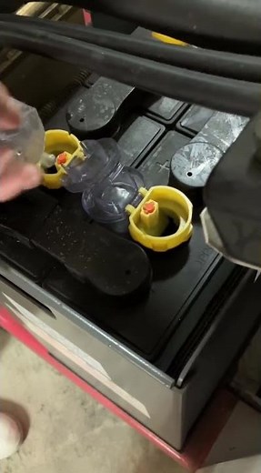 Refilling the forklift battery water