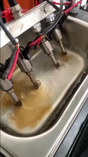 Ultrasonic cleaning of car fuel injectors