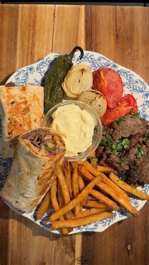 Amna on Instagram: "Tonight’s dinner is inspired by @mezemike 🌯 Ingredients: Spicy tomato sauce: 1 tbsp olive oil 3 tomatoes 2 cloves garlic, minced 1 tbsp chopped cilantro 1/2 tbsp red pepper flakes (adjust to taste) 1 tbsp paprika Salt & black pepper to taste Doner Kebab 1 lb ground beef (85 Lean/15 Fat) 3 tbsp Greek yogurt 1 tbsp paprika 2 tbsp baharat seasoning (homemade mix below): 1/2 tsp curry powder 1/2 tsp black pepper 1/2 tsp allspice 1/2 tsp cinnamon 1/2 tsp cardamom 1/4 tsp cumin 1/