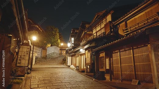 Ninenzaka Walkway empty during nighttime with traditional japanese houses and stone path in Gion, Kyoto, Japan.