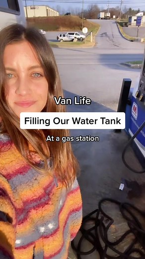 Filling Our Water Tank at a Gas Station