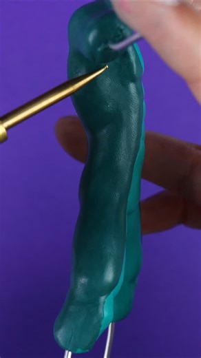 ClayClaim on Instagram: "How to Get Awesome Patterns & Textures on Clay – Sculpting Mysterio! Ever wondered how to create detailed textures on clay? Watch as I show you two techniques on Mysterio’s suit and boots. #polymerclay #clayclaim #fortnite #gaming #clayhack #sculpting #diy"