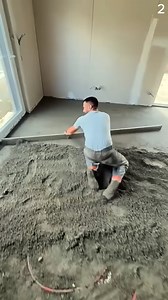 This person is leveling a sand or concrete surface with a leveling rod, a common task in building foundations or floors. #Amazing #AbsolutelyAmazing #SoAmazing #JustAmazing #TrulyAmazing | Casa Irrera Messina
