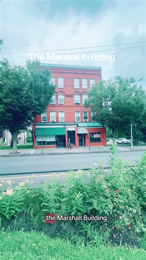 At 111 Main Street in Danbury is a commercial and apartment building erected in 1890-1891. The upper stories of the front facade feature different window designs on each floor. A stone set in the middle of the facade on the fourth story is inscribed: “Marshall, 1890.” The building’s original cast iron storefront was covered when the storefront was later extended.#architecture #old #commercial #brick #danburyct | City of Danbury Cultural Commission