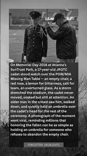 He Stood Guard at the Missing Man Table in the Rain. A Stranger Held the Umbrella.