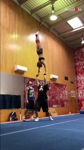 Gymnastics Fails: College Cheerleader's Stunt Mishap || WooGlobe