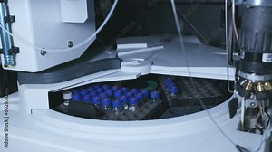 Close up auto sampler collects sample for HPLC analysis. Chromatographic separation of compounds. Metabolomic and Proteomic analysis