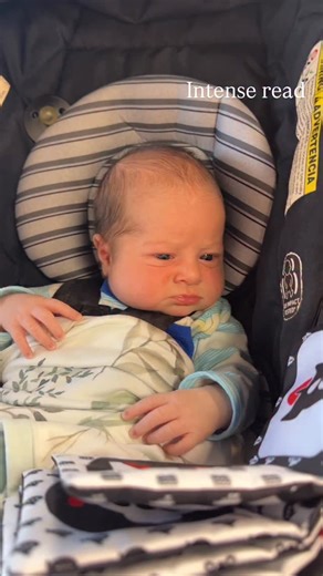 His book must be dang good to get that level of concentration. Baby Atlas at 2 weeks old. #cutebaby #babyfever #momlife #momhumor | Gwynyth