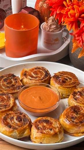 Bayan Bites on Instagram: "Quick & Easy Puff Pastry Party Bites ✨ Crispy, cheesy, and so easy to make! These puff pastry party bites with sausage, garlic butter, and cheese are perfect for any get-together. Bake, dip, and enjoy! 😋 Ingredients: • Puff pastry — 1 sheet (245 g) • Parsley — 25 g, chopped • Melted butter — 30 g • Salt — ½ tsp • Garlic — 3 cloves (grated or finely chopped) • Beef sausage — 200 g • Mozzarella cheese — 200 g • Egg yolk — 1 + 1 tbsp milk (for egg wash) Chili Sweet Sauce