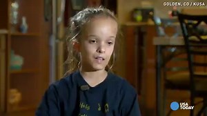 Young swimmer with dwarfism racking up the medals