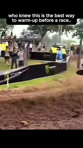 A motorcyclist shows off their incredible wheelie skills on a dirt track. Watch as they maneuver past sponsor banners, displaying precision and control. Truly impressive! #Motorcycle #Wheelie #DirtTrack #Sponsors #BikeLife | Viral MX