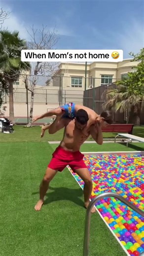 She will never know 🤣 #wwe #dad #sons #pool #wrestling (via haroontwins/IG)