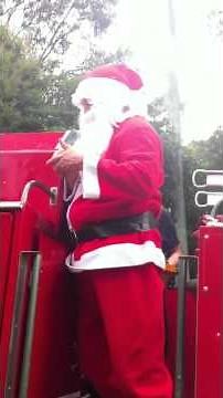 Santa visits in a Fire Truck in Ferntree Gully, Melbourne Vic. 18th December 2011.