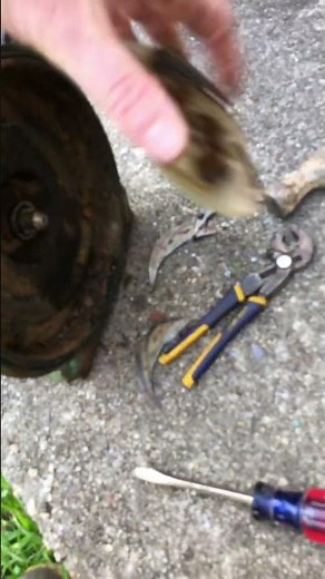 Removing impeller nut on centrifuge sprinkler pump, installing new shaft seal on pump for sprinkler