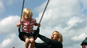 Mom Pushing Child On Swing Slow Stock Footage Video (100% Royalty-free) 4636718 | Shutterstock