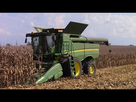 Four John Deere S670 Combines Harvesting Corn