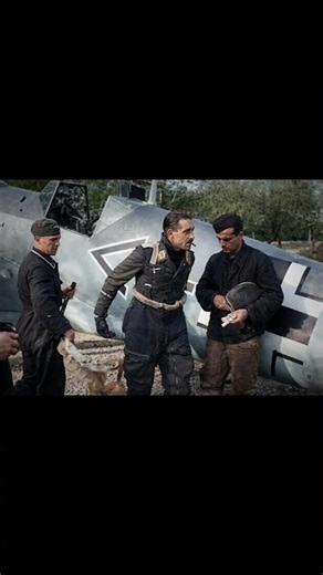 High scoring Ace Adolf Galland (104 victories) hopping out of his Bf-109E. 1940
