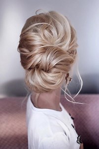 20 Trendy Low Bun Wedding Updos and Hairstyles 2024