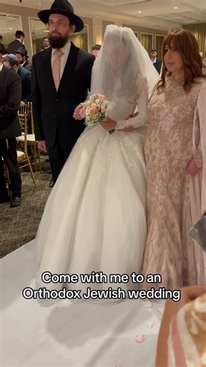 Miriam Malnik-Ezagui on Instagram: "Orthodox Jewish bride and groom walk down the isle to the chuppah in the marriage ceremony #wedding #bride #groom #jewish"
