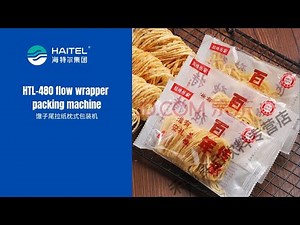 How does a flow wrapper packing machine work?