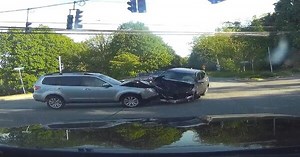 Caught On Camera: Two Cars Collide Head-On At Intersection Sparking Fire