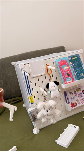 ArtistBooths🟦🌱custom artist alley booths & displays shop on Instagram: "No more cable ties ... we have a lighter beautiful way to indecisively display your art now . Custom coloured pegboards that match our boof panels and connectors precisely . Hang anything and display your art with shelves or racks or tiered racks however ever you want Reduce the load of your metal panel grids or wood shelves and carry more stock to your next market. Open for order , DM us to order so we can keep up with th