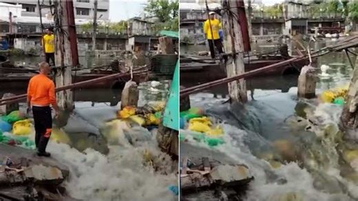 Sandbag wall controlling flood water in Navotas collapses