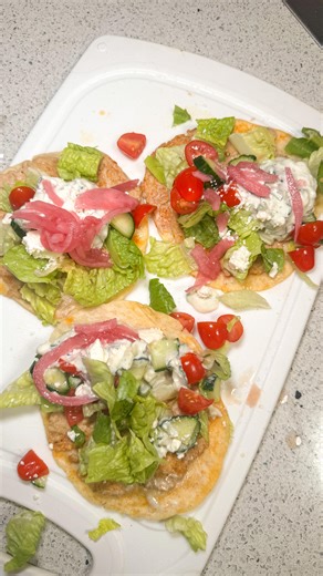 Bridget on Instagram: "Greek Chicken Smash Tacos! Easy weeknight dinner because they are so easy to make! Love how you can add any topping to change them up too! I topped mine with lettuce, cucumber, tomato, tzatziki, feta and pickled onions"