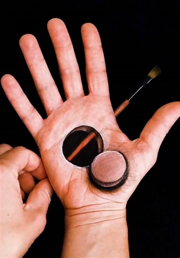 Vika Bren is a visual artist who explores the fragile boundary between reality and illusion. Her work often features hyperrealistic body and hand art that twists three-dimensional perception, challenging how we understand form, space, and the physical body. Driven by her bold “Keep It Weird” philosophy, she creates worlds where reality feels unstable and imagination takes control. Her art invites viewers into a shifting visual experience where nothing is quite as it seems. Artist: @Vika Bren #ar