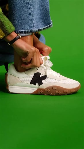 Stylish Mesh-Trimmed Leather Sneakers by Kate Spade