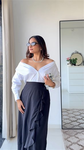 MAULI PATEL 🧿 on Instagram: "A black ruffled skirt you can style for both winters & summers such a cool, versatile piece @femmellaofficial 🖤 comment for outfit links 🔗 . . . Winter fashion , black skirt , ruffle skirt , cashmere sweater , cardigan styling , grey over coat , vacation looks , how to style , ways to wear , Christmas outfits , new year eve"