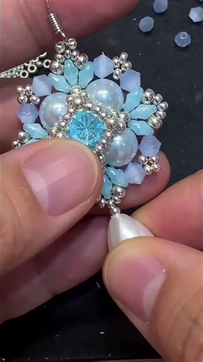 Creating this ethereal sky-blue beaded snowflake earring was pure therapy! 💙