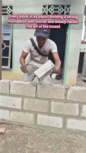 Watch: Expert masonry work with mortar and blocks.