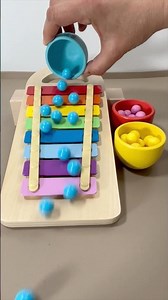 Relax to the little balls running down a rainbow slope - musical marble run