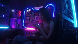 Professional Streamer and gamer wearing glasses playing online video games