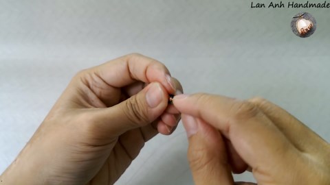 Eye ring with small crystal - Herringbone wire wrap bead 389