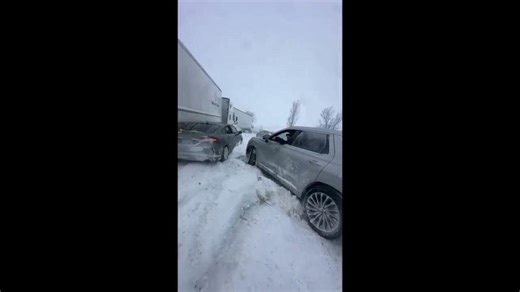 Phone video shows aftermath of 100-vehicle pileup during Michigan snowstorm