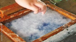 Mulberry paper making process. Make the wet mulberry paper.