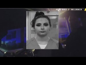 Video: Woman kicks police during DWI stop