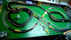HO SLOT CARS vs FREIGHT TRAIN HO Scale Layout - Crashes at Road & Rail crossing