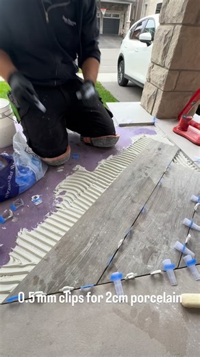 1.8K views | Did you know @peygran makes tall 0.5 mm clips? They were devised for countertops but work great with any 2cm porcelain as well. Let’s not forget those clear wedges to prevent any markings on the tiles… #Tiles #tilesetter #artisan #contractor #details #moderndesign #interiordesign #custom #quality #renovation #construction #flooring #porcelain #slabs #craft #precision #modern #bathroom #luxury #luxuryhomes #toronto #gta | San Marco Tile Company | Facebook