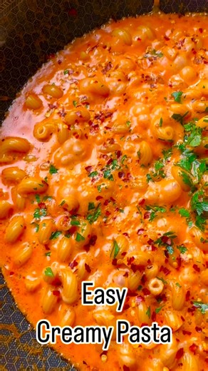 Chhaya Joshi Daily food / cocktails on Instagram: "Easy Creamy Pasta 10 out of 10 !!! The best pasta and so easy ! 1. 12 ounce dry pasta 2. One shallot sliced or red onion 3. 5 garlic cloves minced 4. 1/4 cup olive oil 5. 3 tablespoons tomato paste 6. 1/2 teaspoon salt and black pepper (broth is salty so be mindful when adding salt) 7. 1 teaspoon oregano and chili flakes (more for garnish) 8. 1 cup broth 9. 1 cup heavy whipping cream 10. 1 cup shredded mozzarella cheese 11. Garnish with Italian 