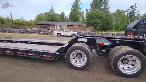 2023 Load King 53x102 Lowboy Trailer For Sale Now at: https://www.itagequipment.com/for-sale/2023-load-king-55-ton-lowboy-trailer-55-ton-26ft-well-mechanical-detachquad-axle-pony-motor-front-flip-ramps-12264478 | ITAG Equipment